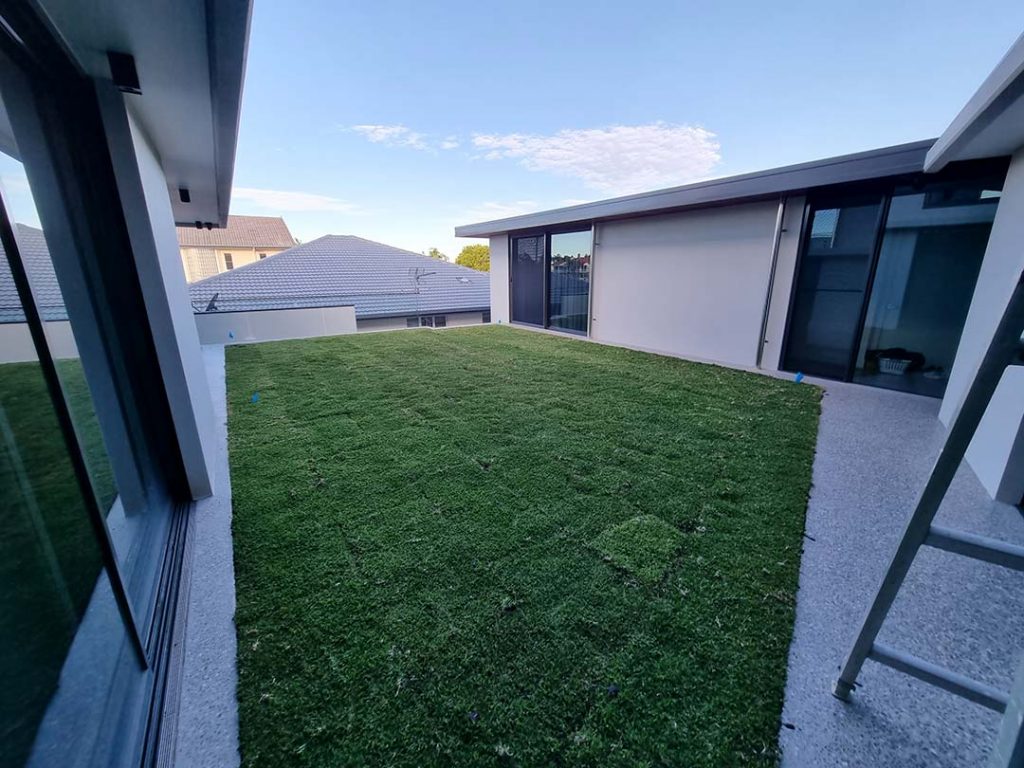 Picture of a rooftop planter box or rooftop garden which was waterproofed with Liquid Rubber DIY Waterproof Sealant and turf is already growing on it.