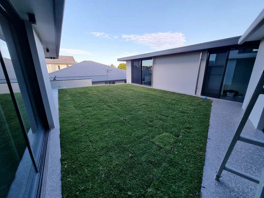 Picture of a rooftop planter box or rooftop garden which was waterproofed with Liquid Rubber DIY Waterproof Sealant and turf is already growing on it.